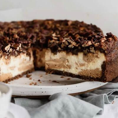 Pecan Pie Cheesecake with Dulce de Leche Swirls